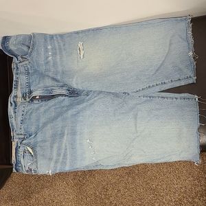 Distressed rip polo shorts